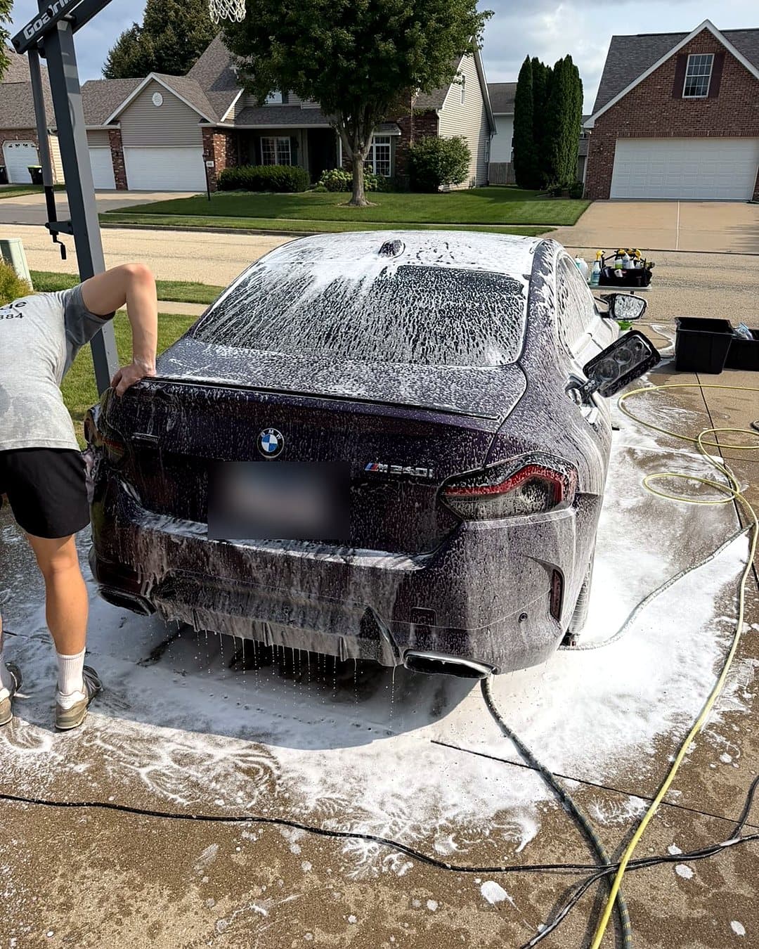 Before: BMW 2 Series foam wash and exterior detail